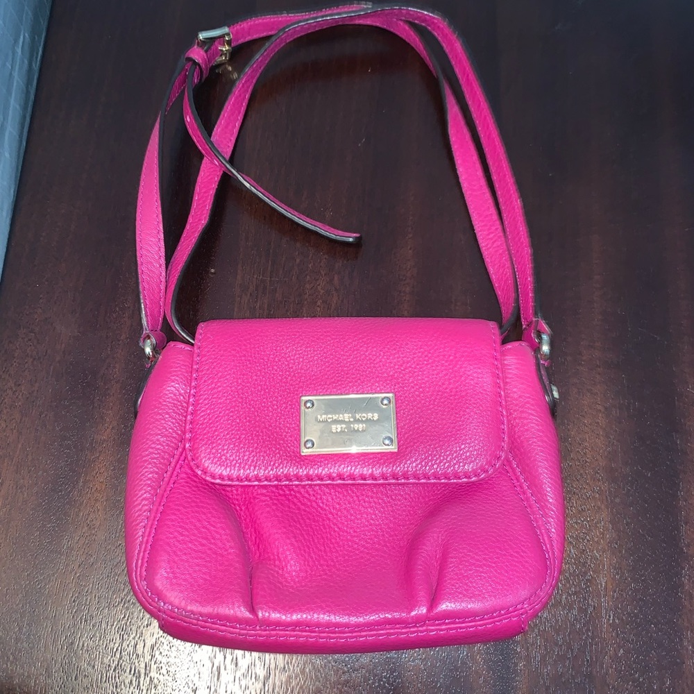 Purple/ pink crossbody Micheal kors bag.